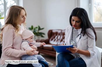 image of parent and pediatrician having a discussion
