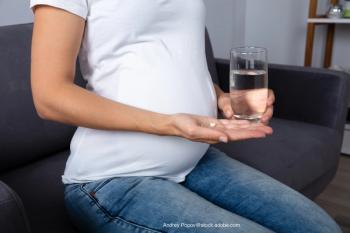 woman taking medication