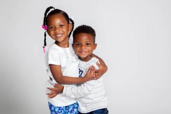 Children hugging | Image Credit: © jbrown - © jbrown - stock.adobe.com.