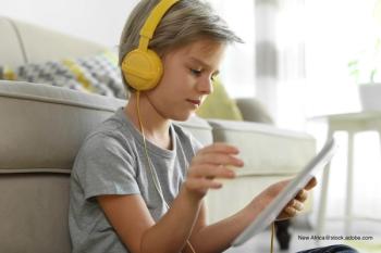 child interacting with media