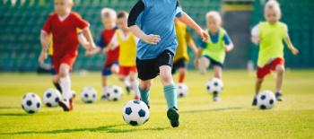 Children playing soccer in the sun | Image Credit: © matimix - © matimix - stock.adobe.com.