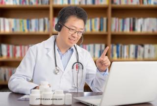 Doctor caring for a patient via telemedicine