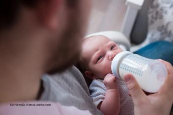 Father with new baby