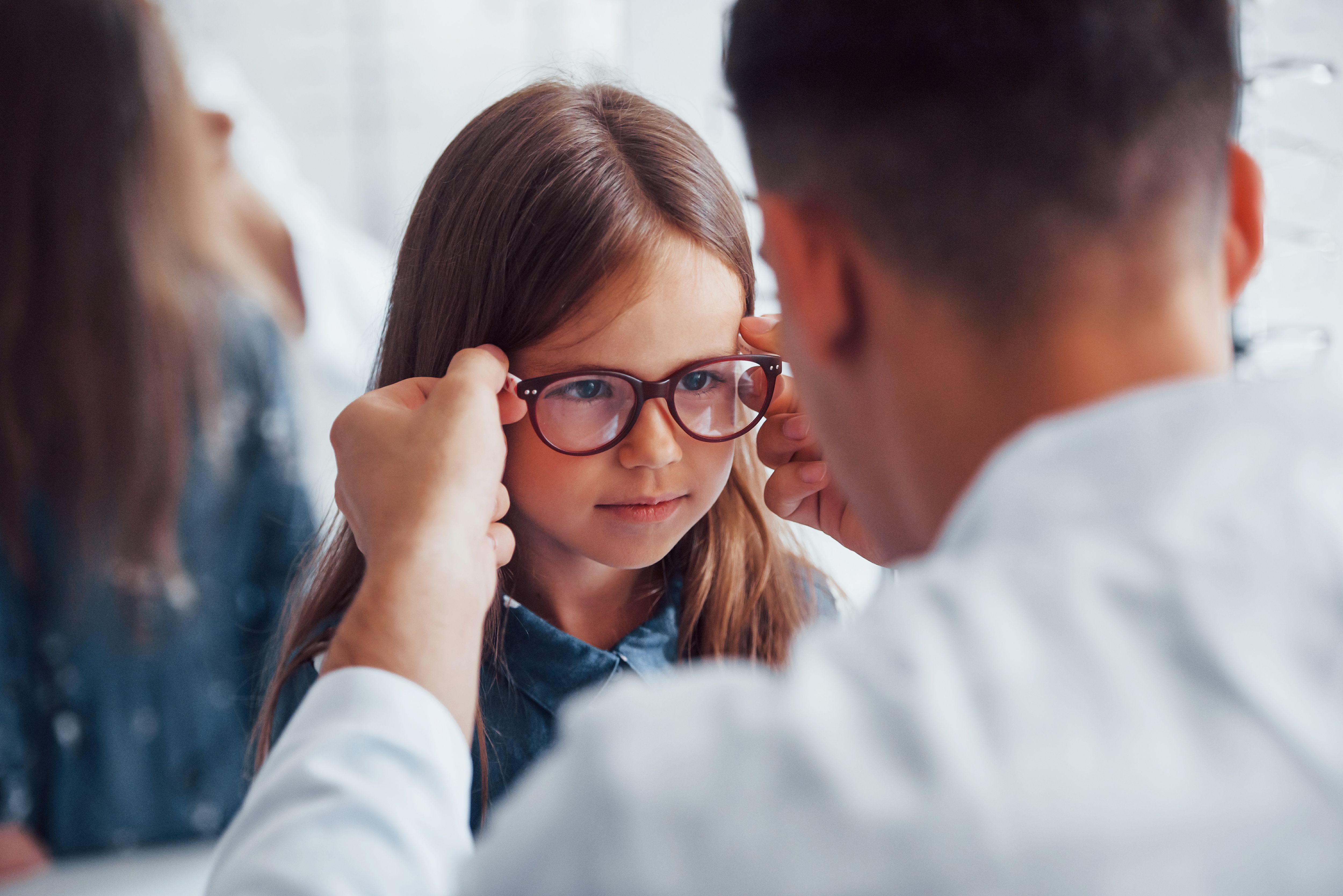 child in glasses