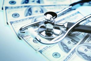 stock image of money and stethoscope
