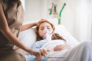 very ill child in hospital