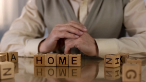 Image of person sitting at home.