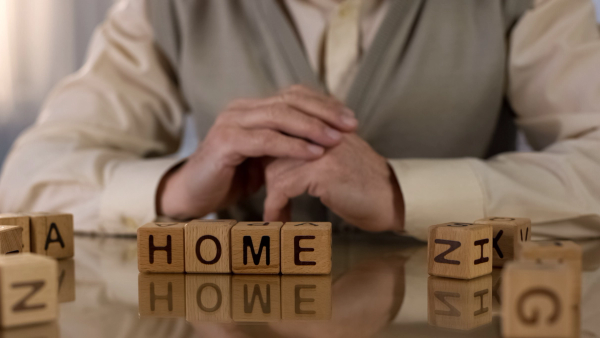 Image of person sitting at home.