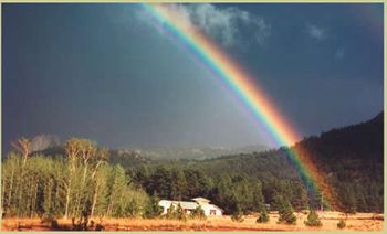 Image of a rainbow in a storm.
