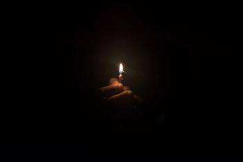 hand holding burning candle in the ark | Image credit: © - rushay © - stock.adobe.com