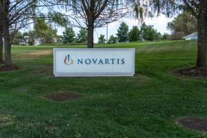 East Hanover, NJ, USA - August 16, 2022: Novartis sign at its headquarters in East Hanover, NJ, USA. Novartis AG is a Swiss-American multinational pharmaceutical corporation. | Image credit © JHVEPhoto