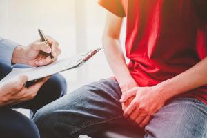 Image of man with doctor.