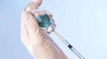 Image of a BTK inhibitor in a vial with a needle.
