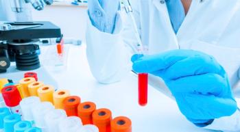 Image of a doctor evaluating a genetic test for breast cancer.