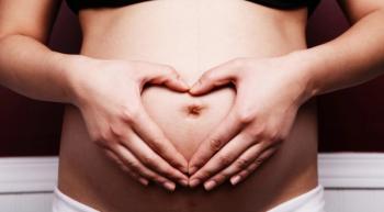 hands over pregnant belly