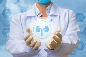 doctor holding image of kidneys