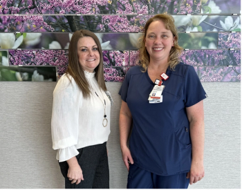 From left: Amy Tootle, M.S., B.S.N., RN, (wearing a white shirt and black pants) and Jessica Smith, B.S.N., RN, OCN (wearing blue scrubs)  Photo provided by Amy Tootle, M.S., B.S.N., RN