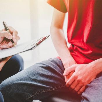 Photo of a patient in consultation with a doctor.