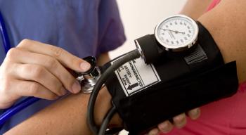 nurse taking blood pressure