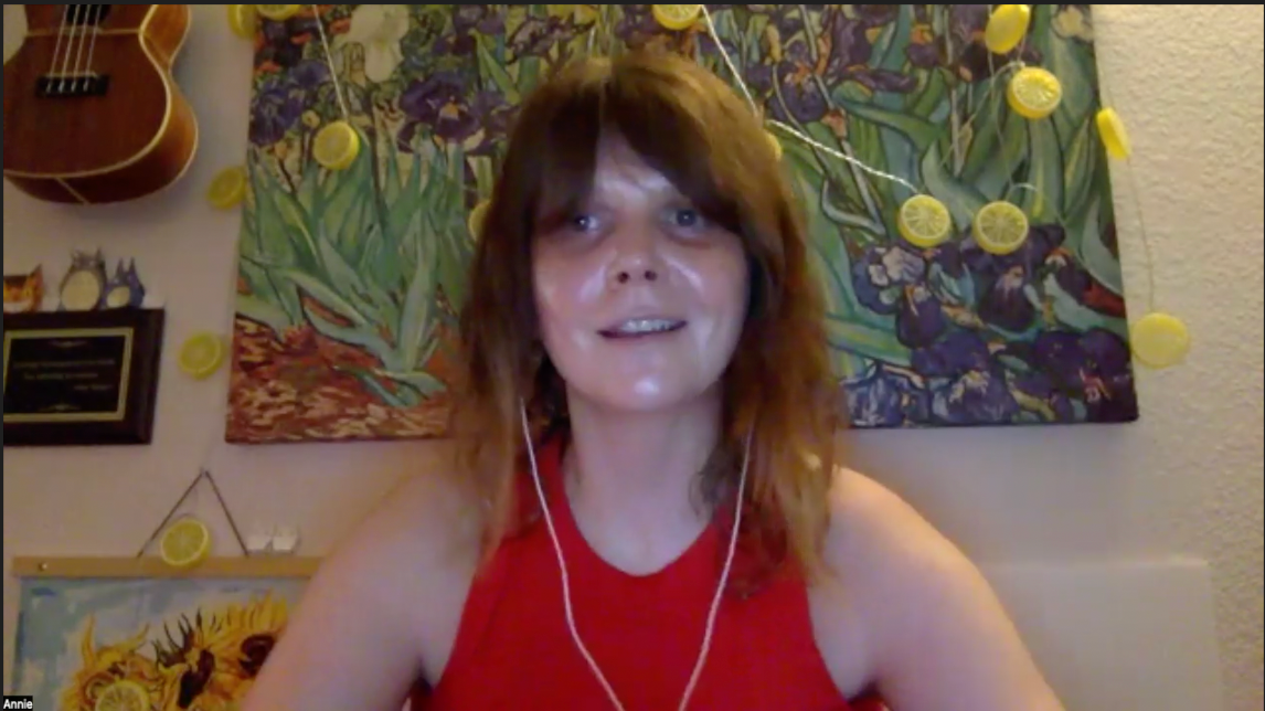 Image of a woman wearing a red tank top.