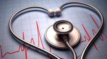stethoscope on top of heart monitor data