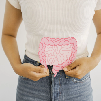 Photo of a person with an illustrated gastrointestinal tract in front of them