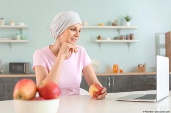 Image of a patient with cancer eating food.