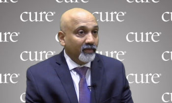 Man in a navy suit with a purple tie. Dr. Saby George talks to CURE about how treatment with Opdivo could mitigate disparities in patients with kidney cancer.