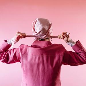 Image of women with pink cap.