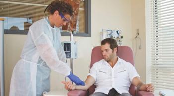 man sitting in an infusion chair