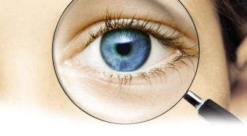 magnifying glass looking at an eye