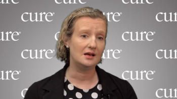 Dr. Meghan K. Berkenstock interviewing against a gray CURE background