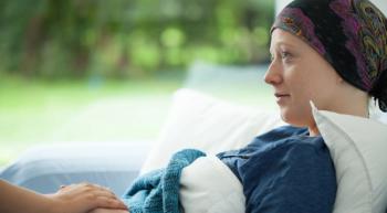 Woman with headscarf experiences fatigue