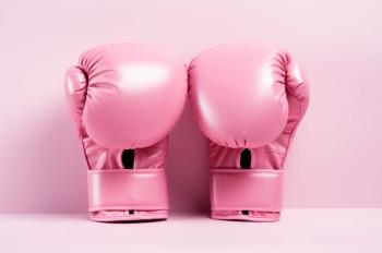 Image of pink boxing gloves.