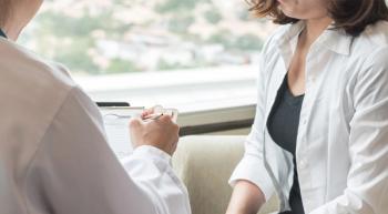 Image of a doctor with a patient. 