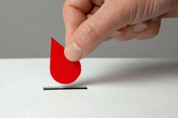 Blood donor. Man puts drop of blood in the piggy bank as donation. Concept donate blood save life | Image credit: © adragan - © stock.adobe.com