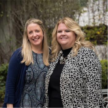 From left: Amanda Kelm, B.S.N., RN, OCN and Amy Hicks Amy Hicks, D.N.P., RN, ACCNS-AG, NEA-BC   Photo by Erica Hasenjager; both women are looking at the camera and smiling