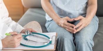 image of a patient speaking with their doctor. 