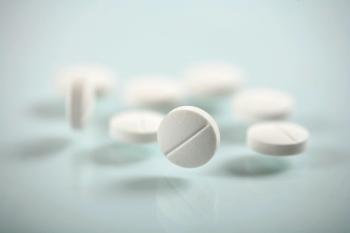 image of pills spilling onto counter