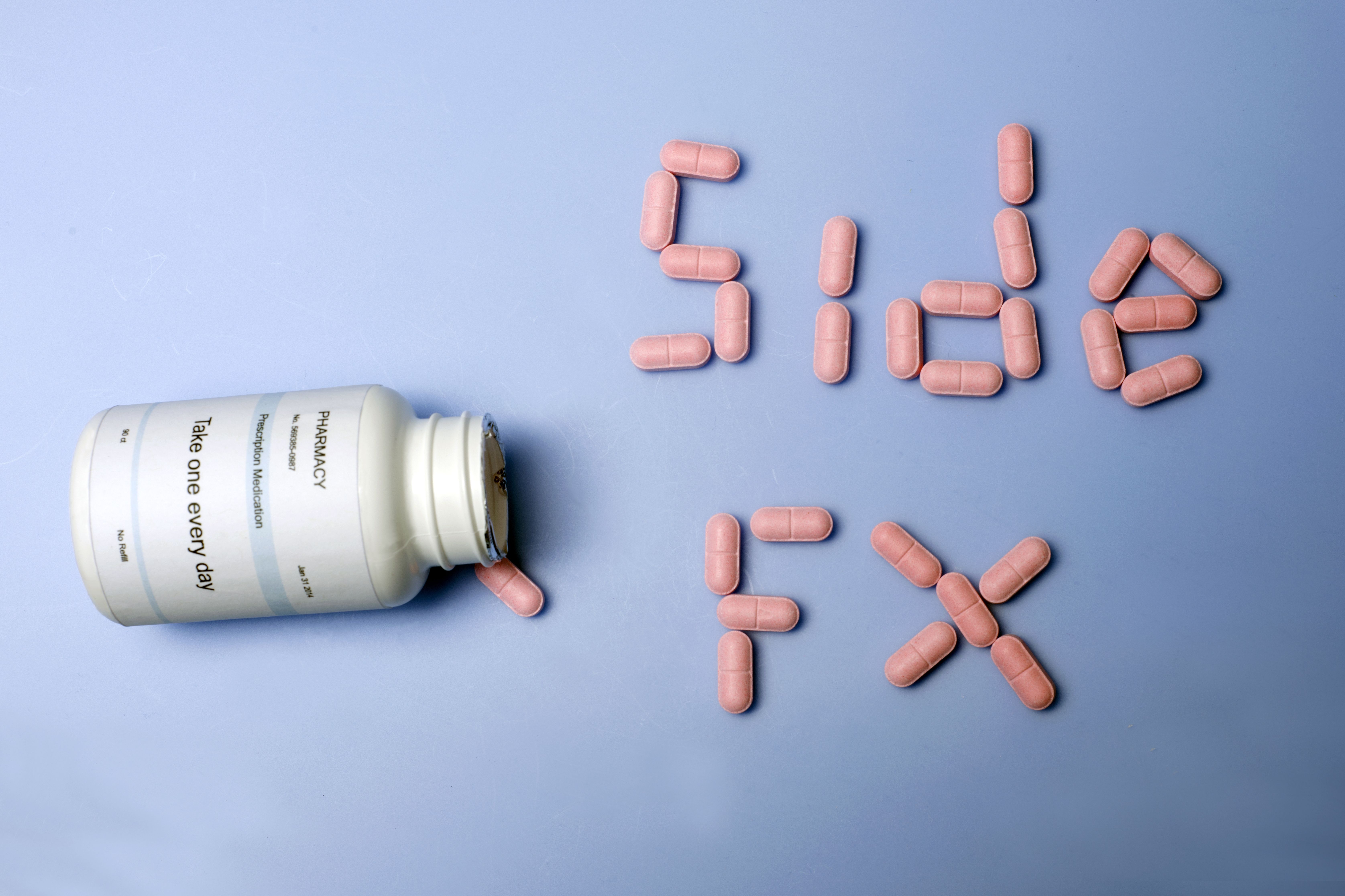 Image of pills that spell "side FX"