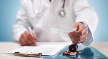 doctor handing out prescription