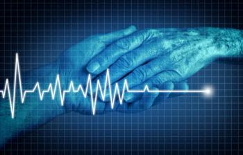 An older man's hand holding a younger man's hand. Over the image is an EKG which is spiking then flatlining