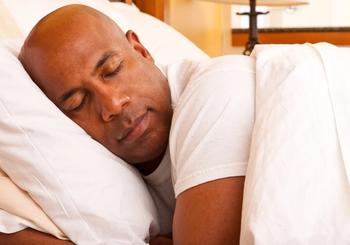 Man is sleeping on a pillow