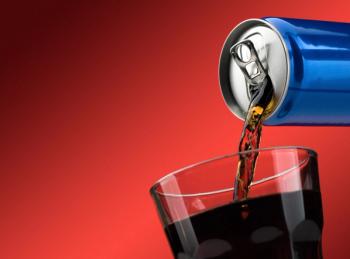soda (cola) being poured into a glass