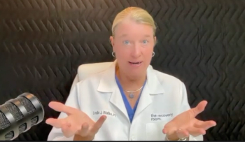 Image of a woman with blonde hair wearing a white medical professional coat. 
