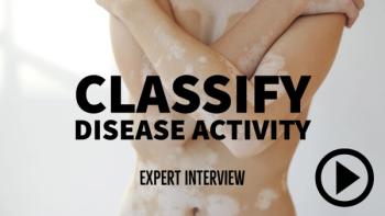 A person with vitiligo crossing arms over torso. Writing: Classify Disease Activity - Expert Interview
