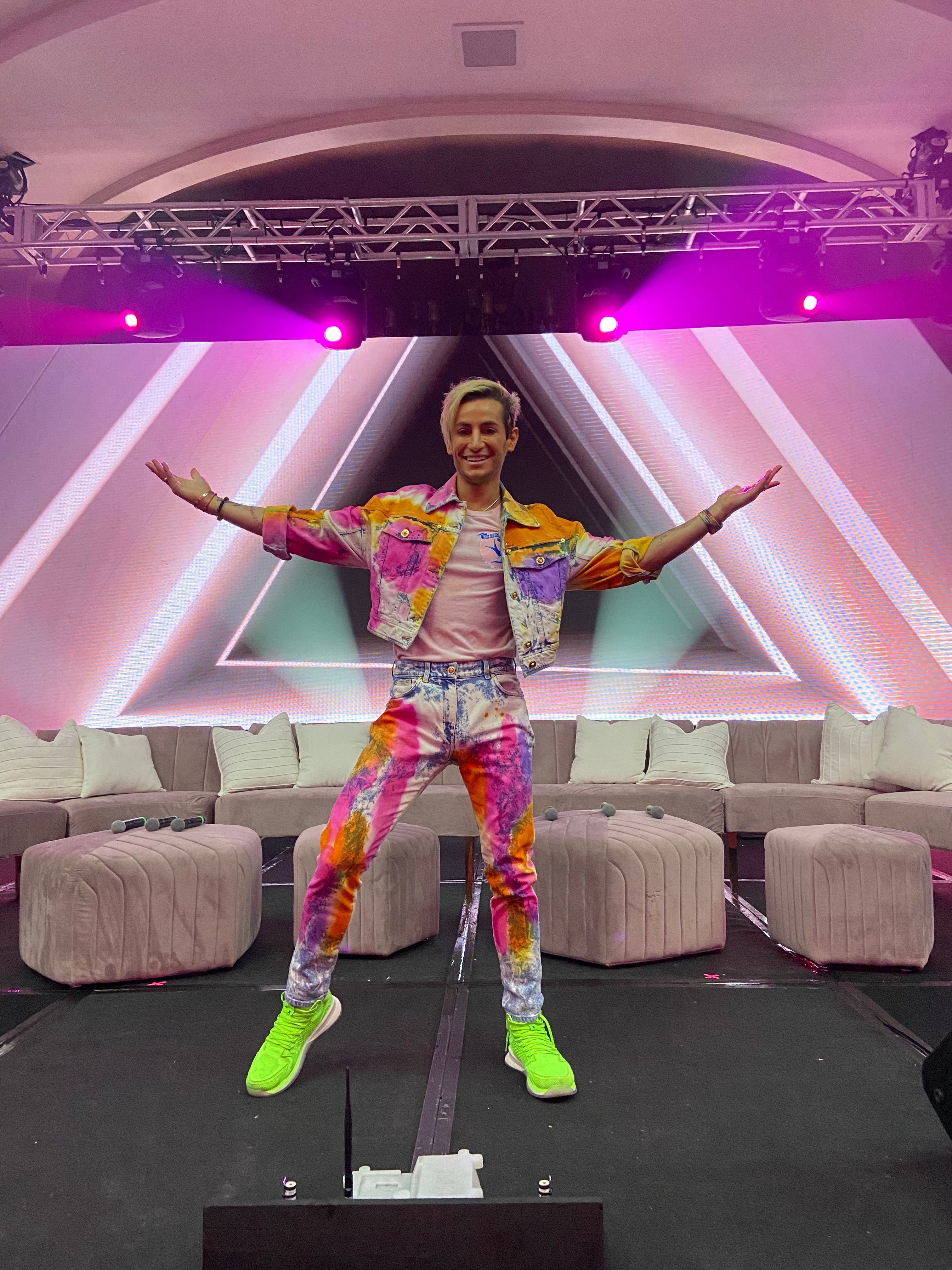 Celebrity guest speaker, Frankie Grande, a Broadway performer and social media mogul, posed for the camera before his panel discussion. 