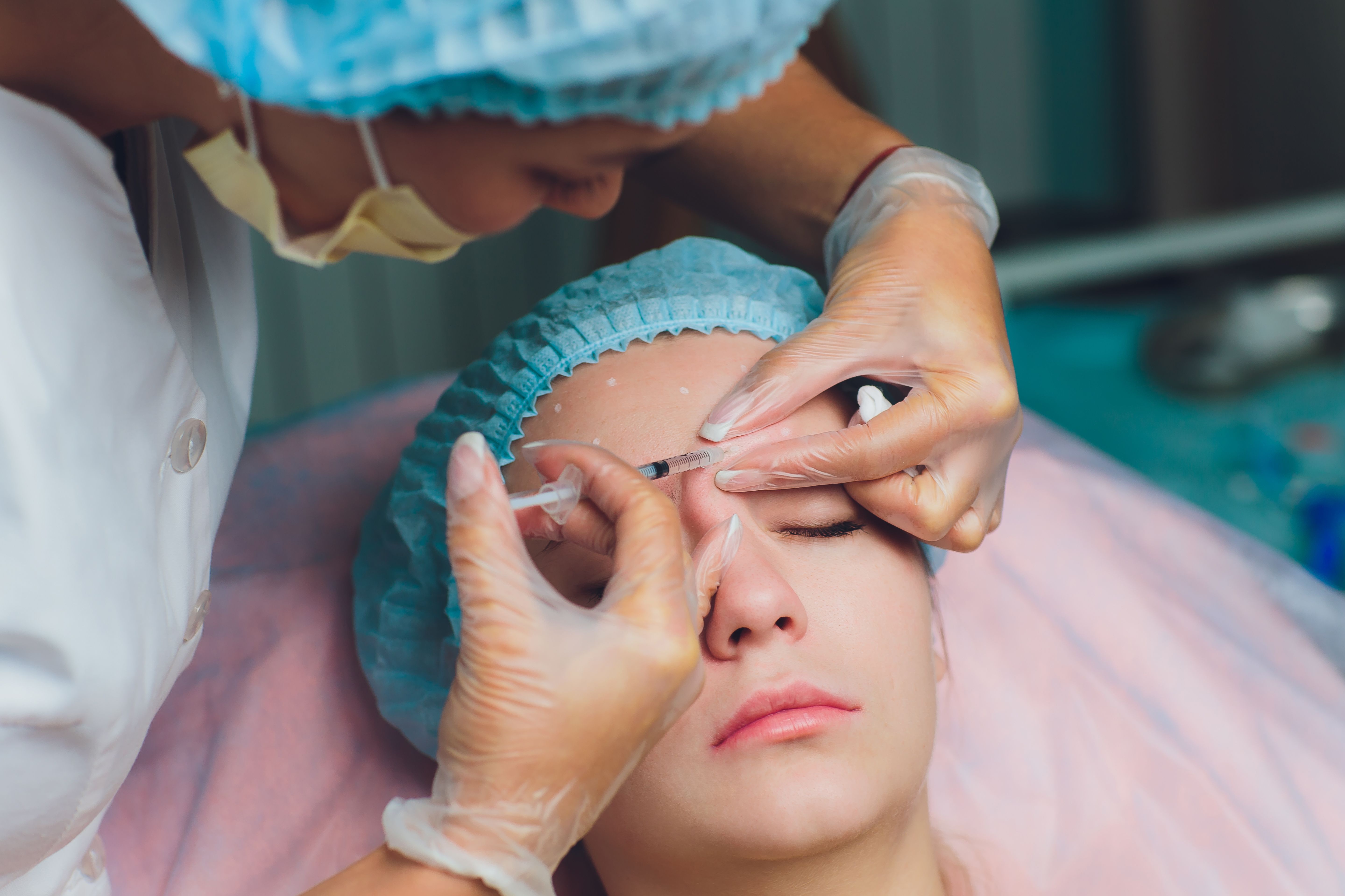 patient receiving facial aesthetic treatment