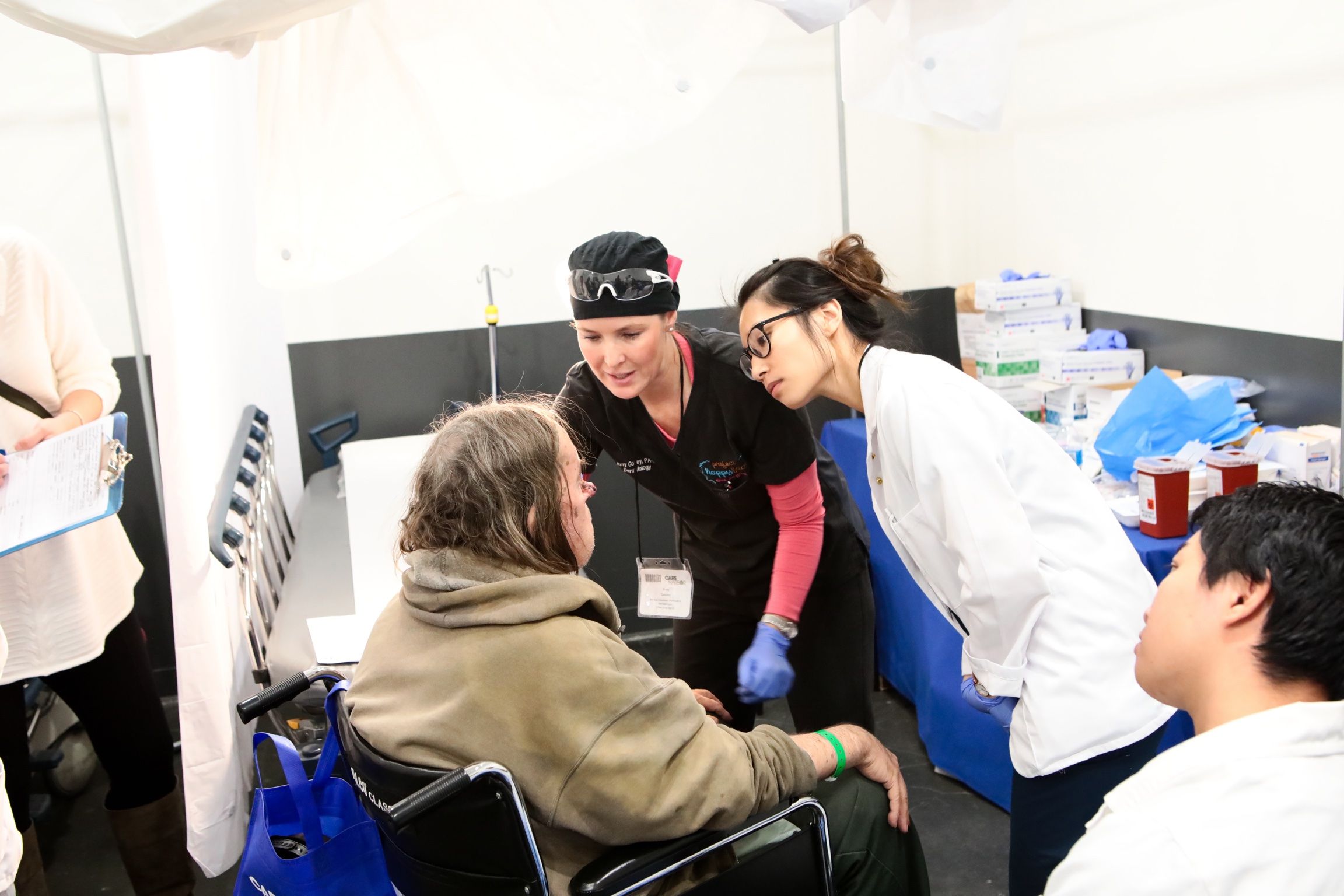 Amy Gouley, PA-C and teens from Project Happy Face.