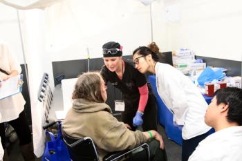 Amy Gouley, PA-C and teens from Project Happy Face.